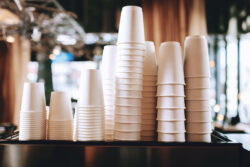 A close-up of coffee cups at a franchise.